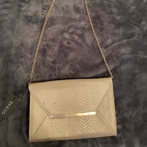 New! Guess dressy purse in color Gold Snake